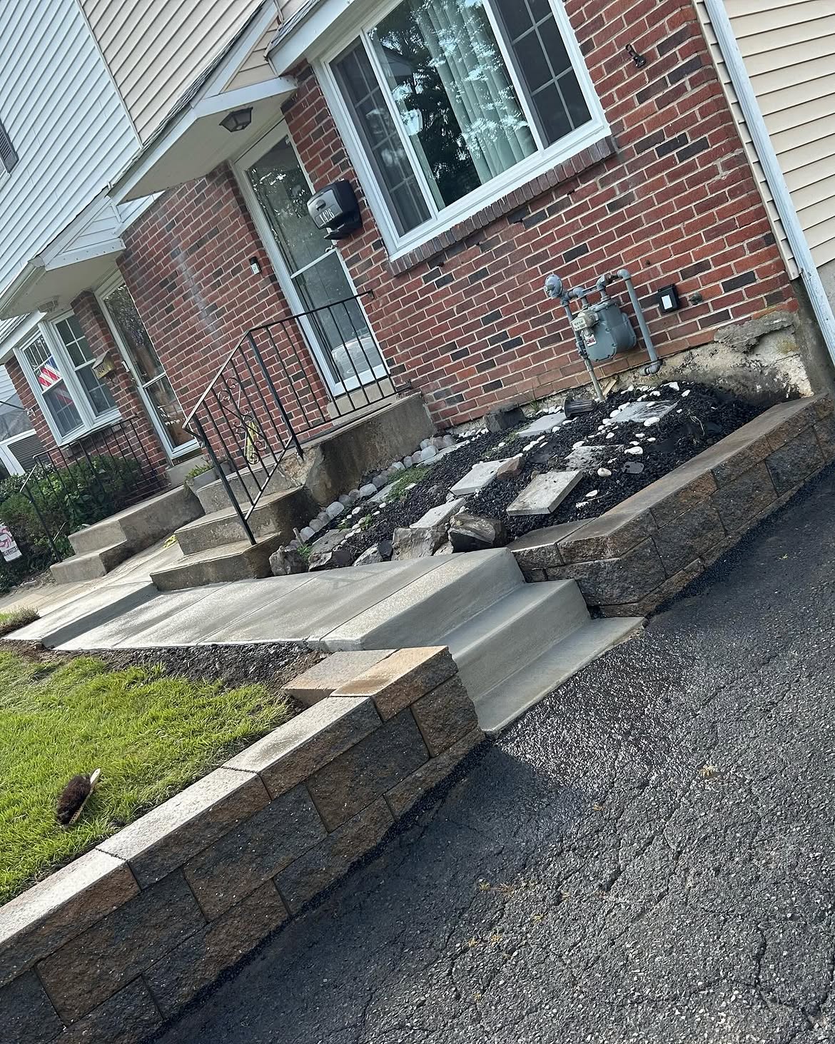 Retaining Wall Rebuild & Concrete Side Steps