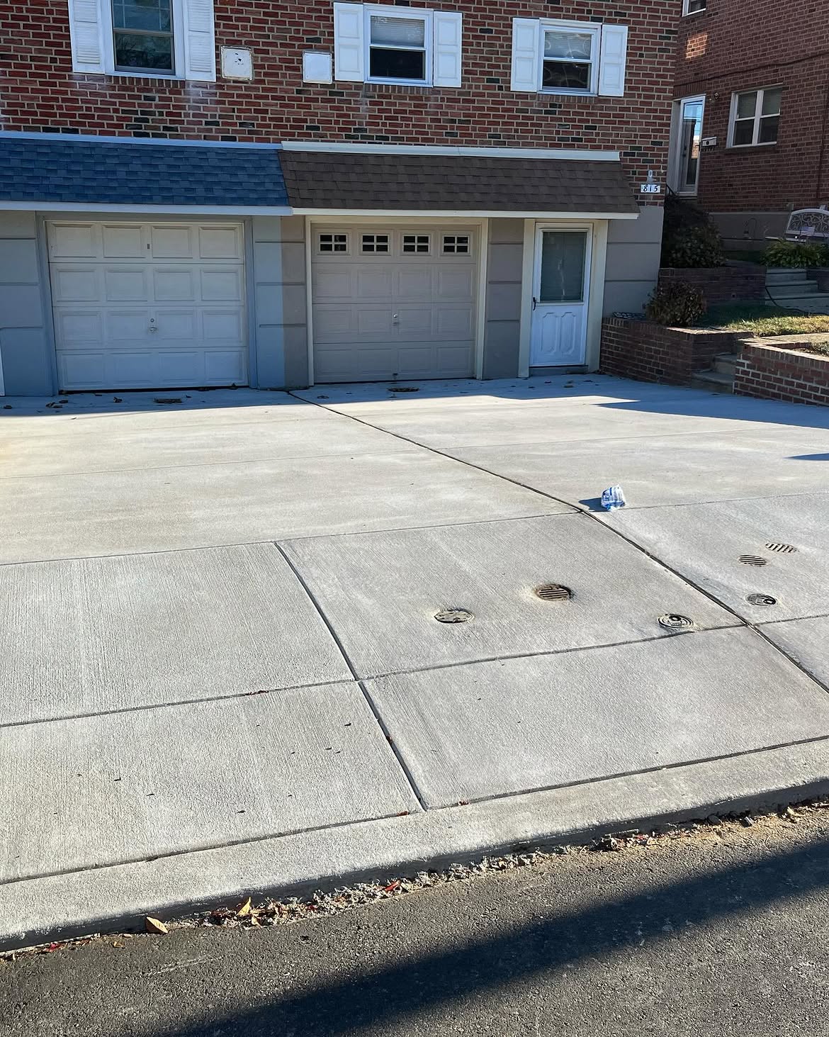 Twin Driveway & Sidewalk Replacement